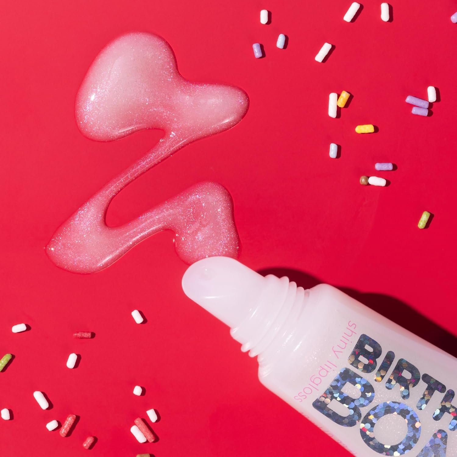 essence BIRTHDAY BOMB Shiny Lip Gloss 01 - Clear Shimmering Vegan Lip Care, 10ml - Image 2